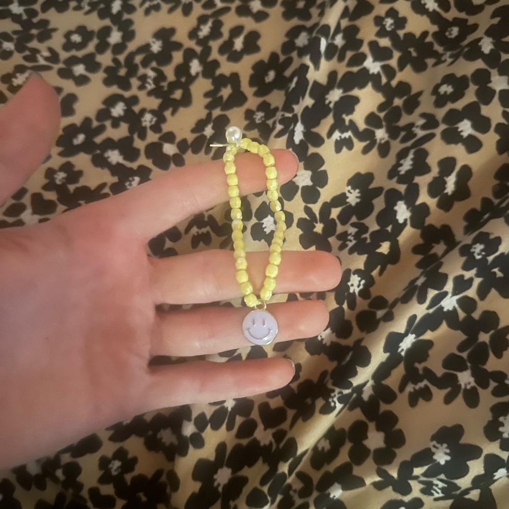 Yellow Beaded Bracelet with Smiley Charm